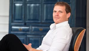 Julian Hosp 08 GST übernimmt Bake: Julian Hosp verkauft Kryptoplattform