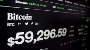 Een afbeelding van de bitcoin koers rondom een belangrijke grens in de buurt van 60.000 dollar Een afbeelding van de bitcoin koers rondom een belangrijke grens in de buurt van 60.000 dollar